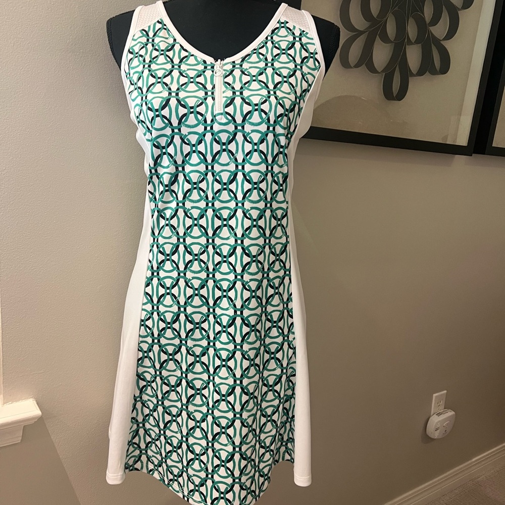 Grand Slam Sleeveless tennis dress White w/Green/Black geometric design